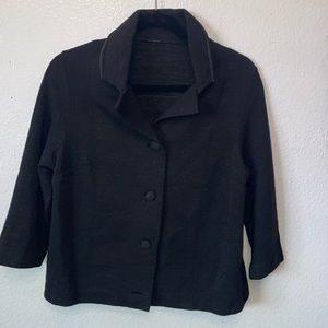 Black knit vintage jacket  3/4sleeves  fabric covered buttons. Sparkles of grey